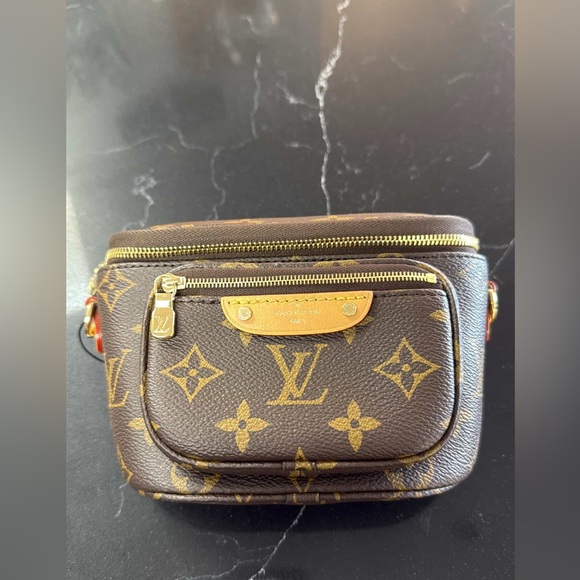 Louis Vuitton Handbags - Louis Vuitton Mini Bumbag in Monogram Canvas Retails: $2160